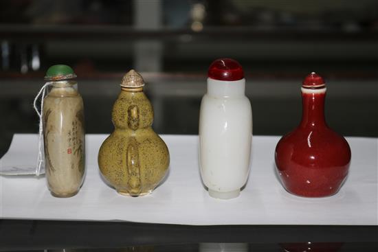 Four assorted Chinese snuff bottles largest 9cm